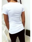 T-shirt blanc en coton avec écriture Vogue à l'avant. Mode femme - 8