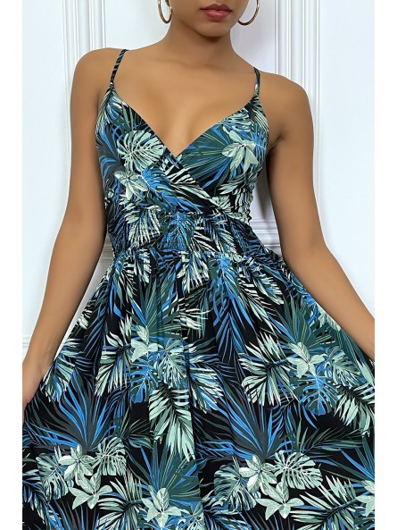 Longue robe d'été bleu royal à imprimé tropical et cintrée à la taille. - 5