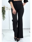 Pantalon palazzo noir avec poches et plis - 4