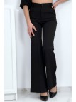 Pantalon palazzo noir avec poches et plis - 8